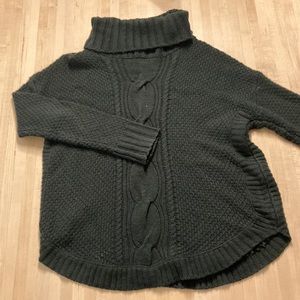 Forrest green sweater.